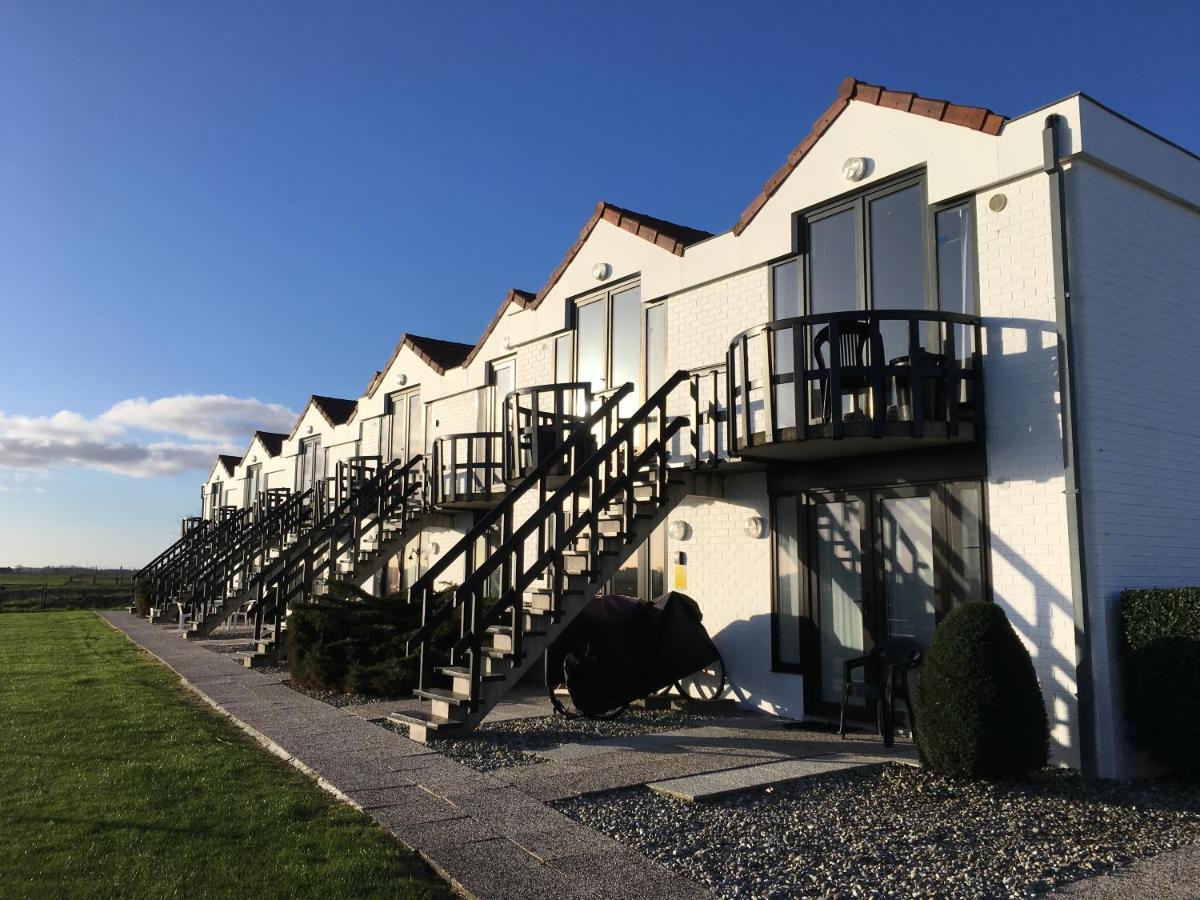 Knus appartement met zicht op zeepolder De Haan Buitenkant foto